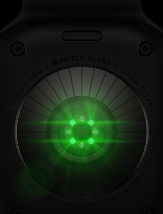 Apple Watch Ultra 4 med urkasse i sort titanium, vist bagfra, talrige runde sensorer med glødende grønne LED-indikatorer